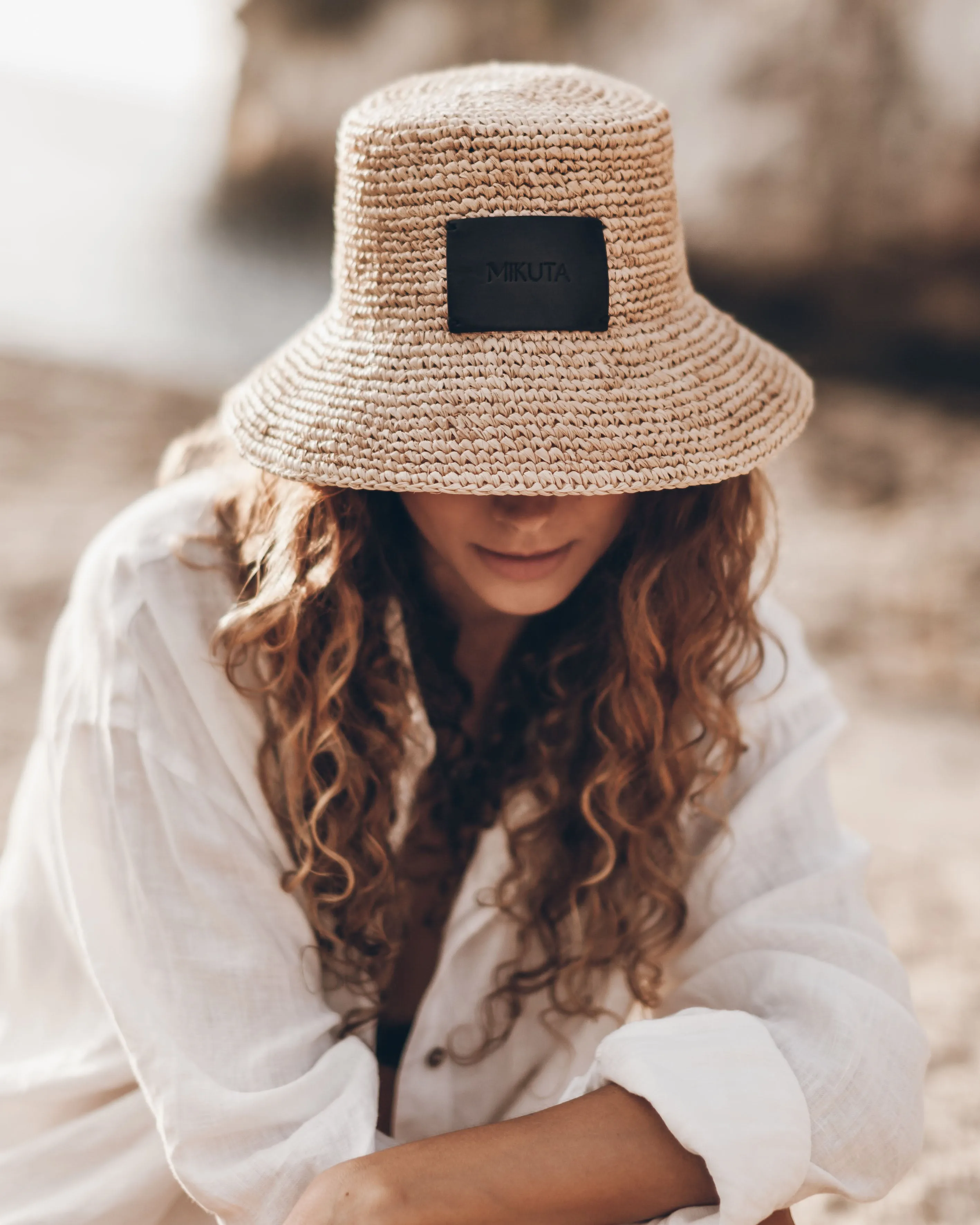 Elegant Natural Raffia Bucket Hat with Handcrafted Details